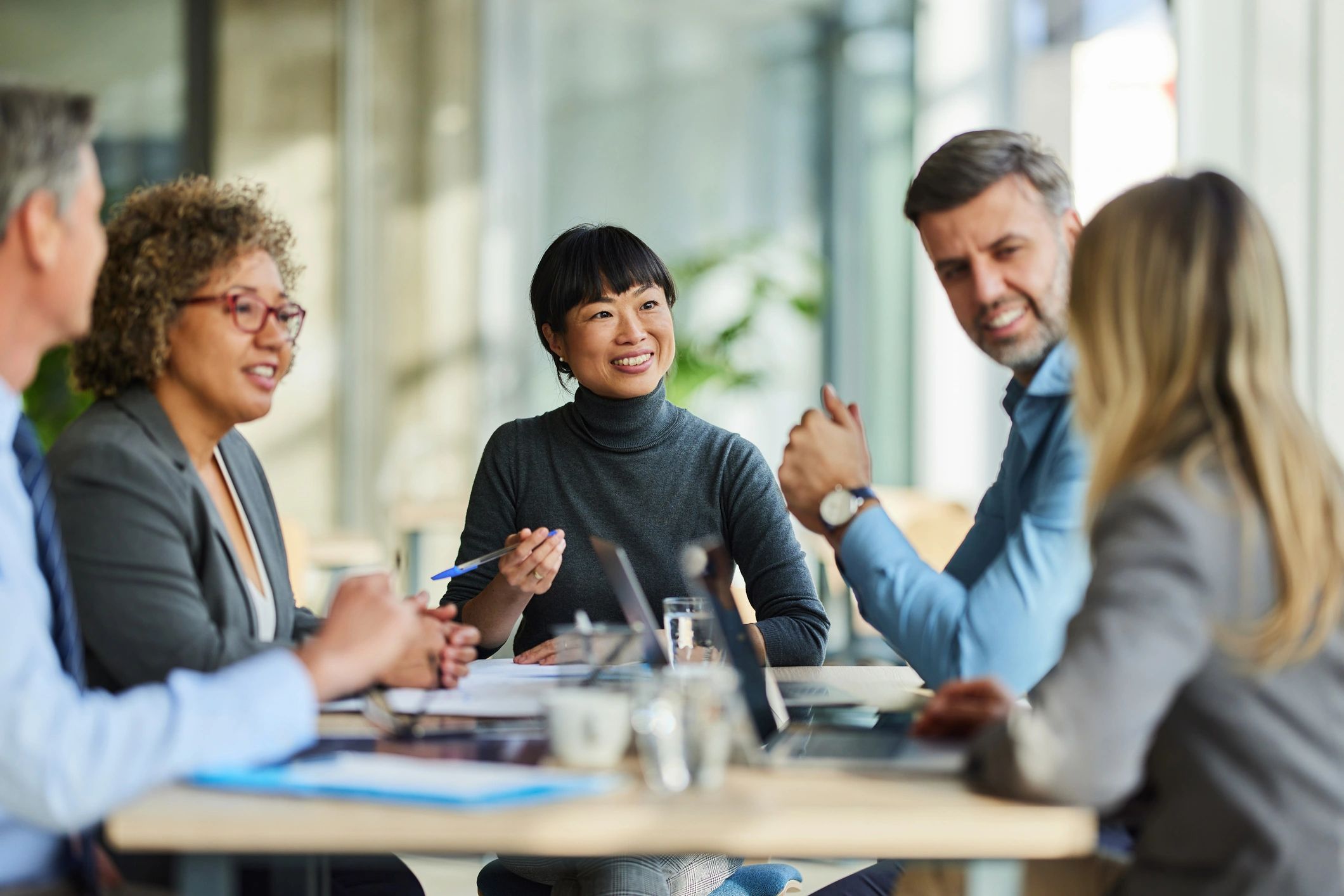 Business team in a collaborative technology meeting